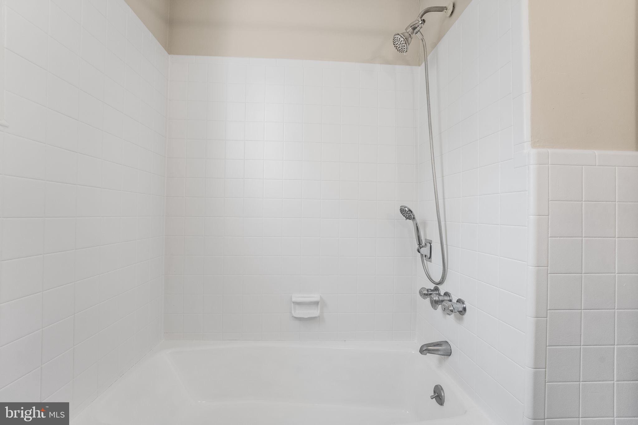 96 Drexel Avenue Lansdowne, PA 19050 - Photo 33 of 58 a close up of a bathtub