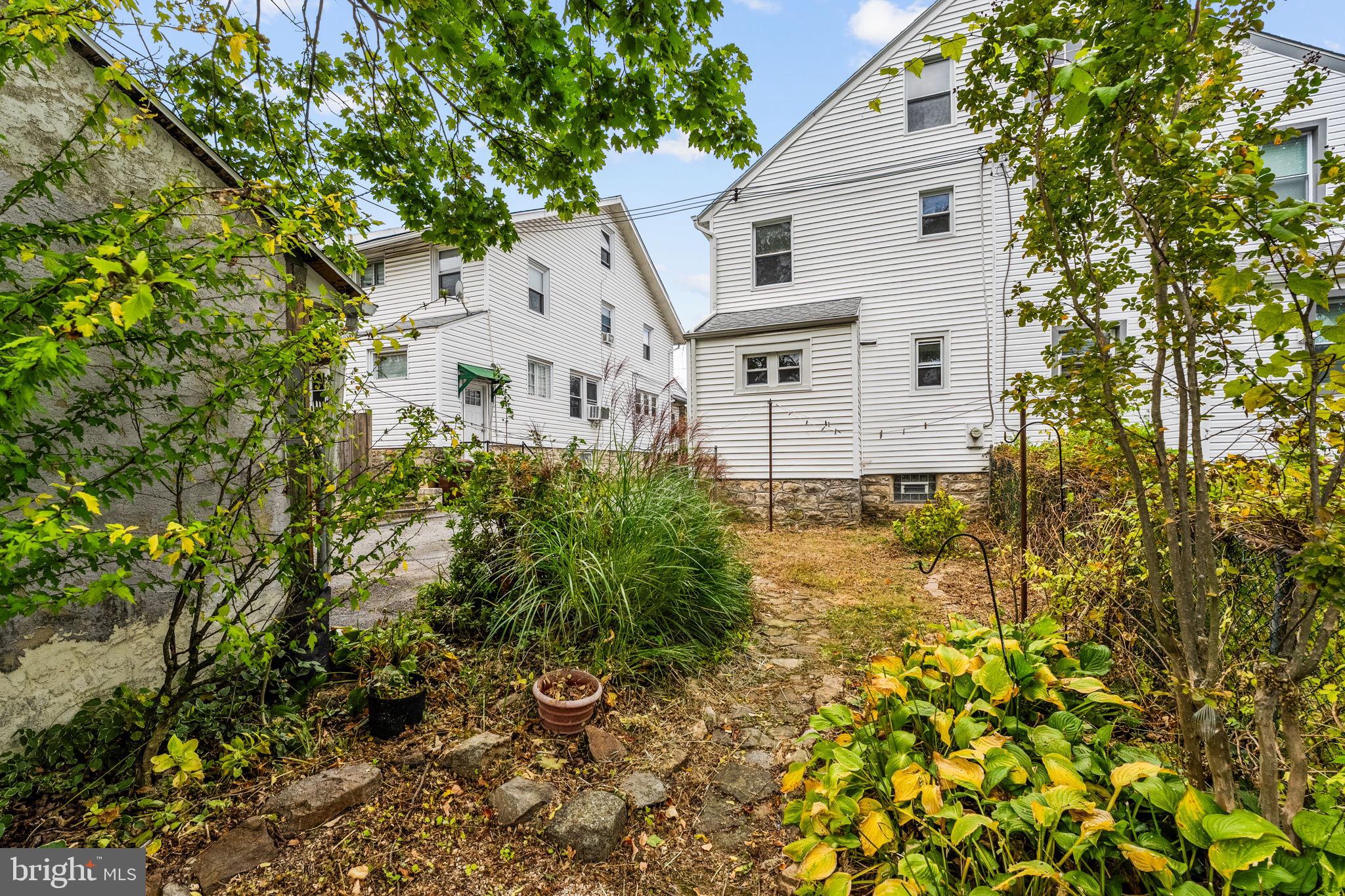 96 Drexel Avenue Lansdowne, PA 19050 - Photo 51 of 58 a aerial view of a house with a yard