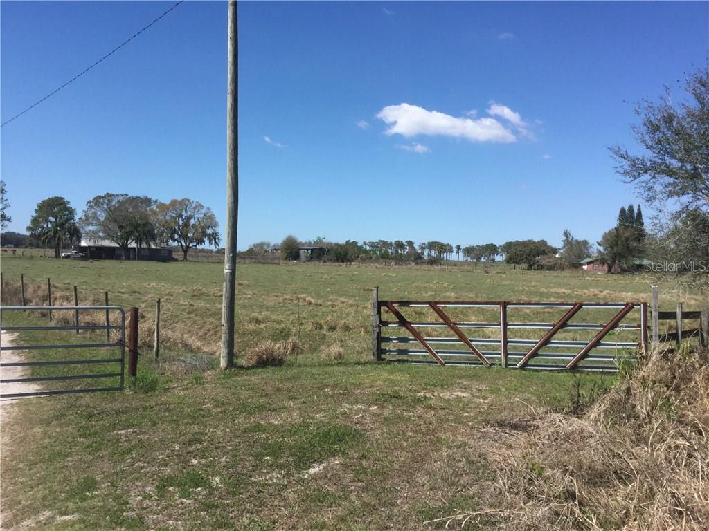 14837 McGrady Road, Unit 1 Wimauma, FL 33598 - Photo 1 of 1 Front Gate