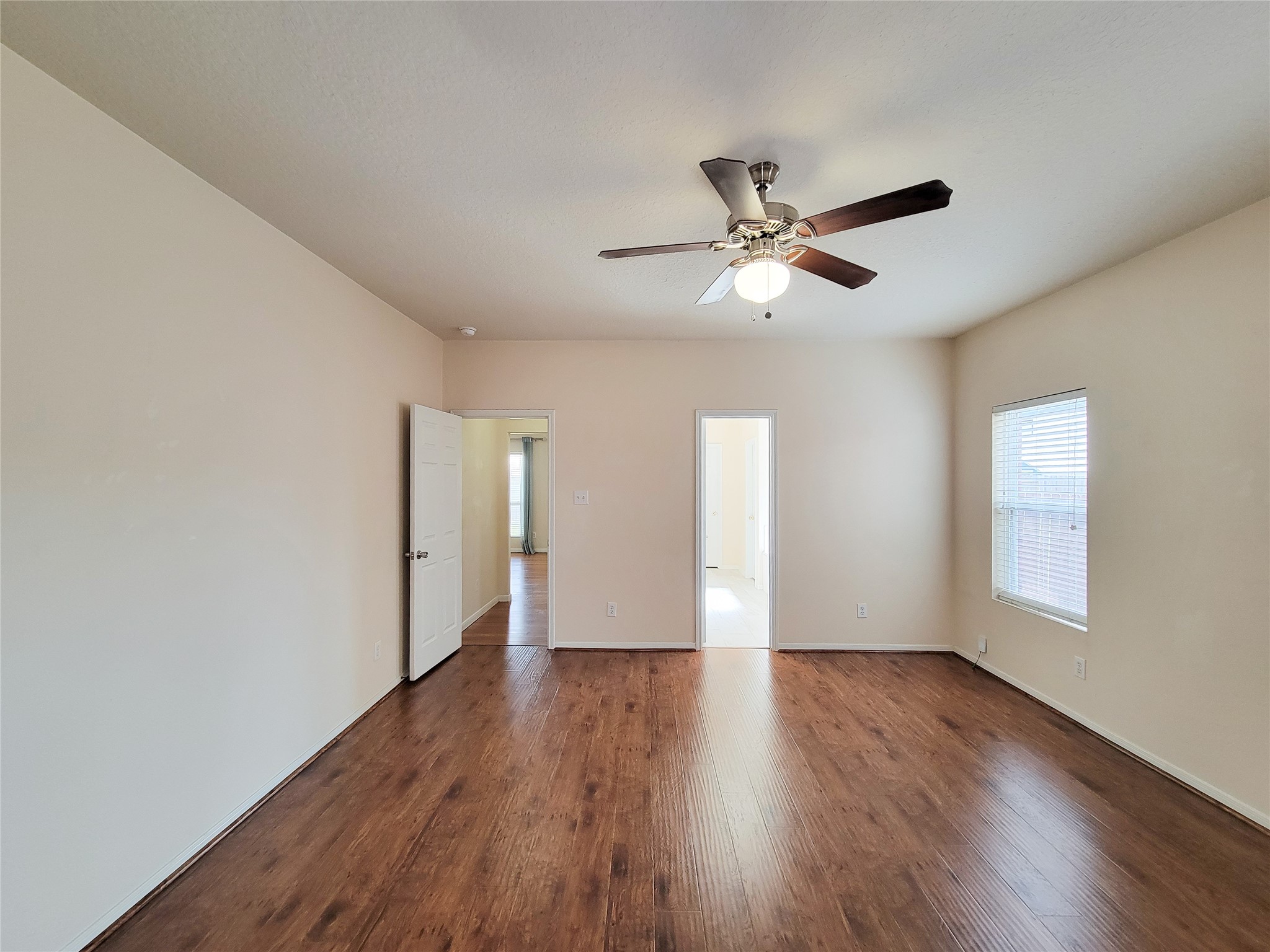 19626 Hardwood Ridge Trail Cypress, TX 77429 - Photo 18 of 48 Primary Bedroom with laminated flooring. Basically, zero carpet flooring on the first floor.