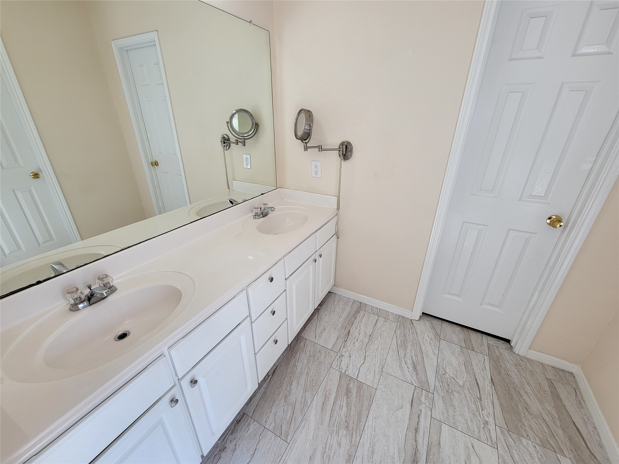 19626 Hardwood Ridge Trail Cypress, TX 77429 - Photo 21 of 48 Another view of the same bathroom with dual sink. Updated tile flooring (Summer 2019).