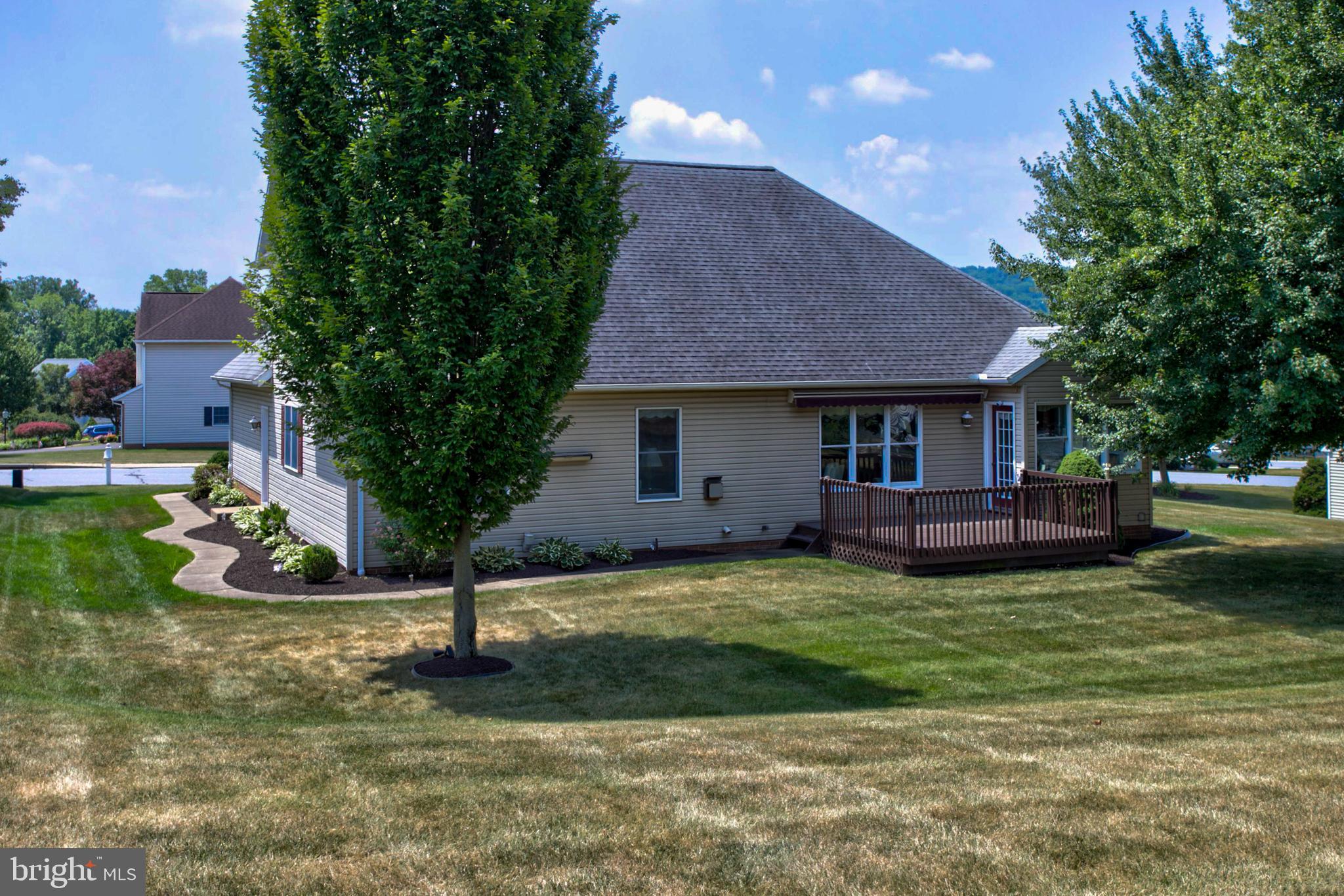 2041 Harrogate Road Lancaster, PA 17601 - Photo 40 of 46 a front view of a house with a garden and trees