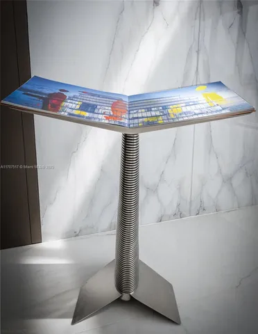 a view of a gym with lots of tables and chairs