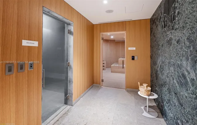 a bedroom with a bed and ceiling fan