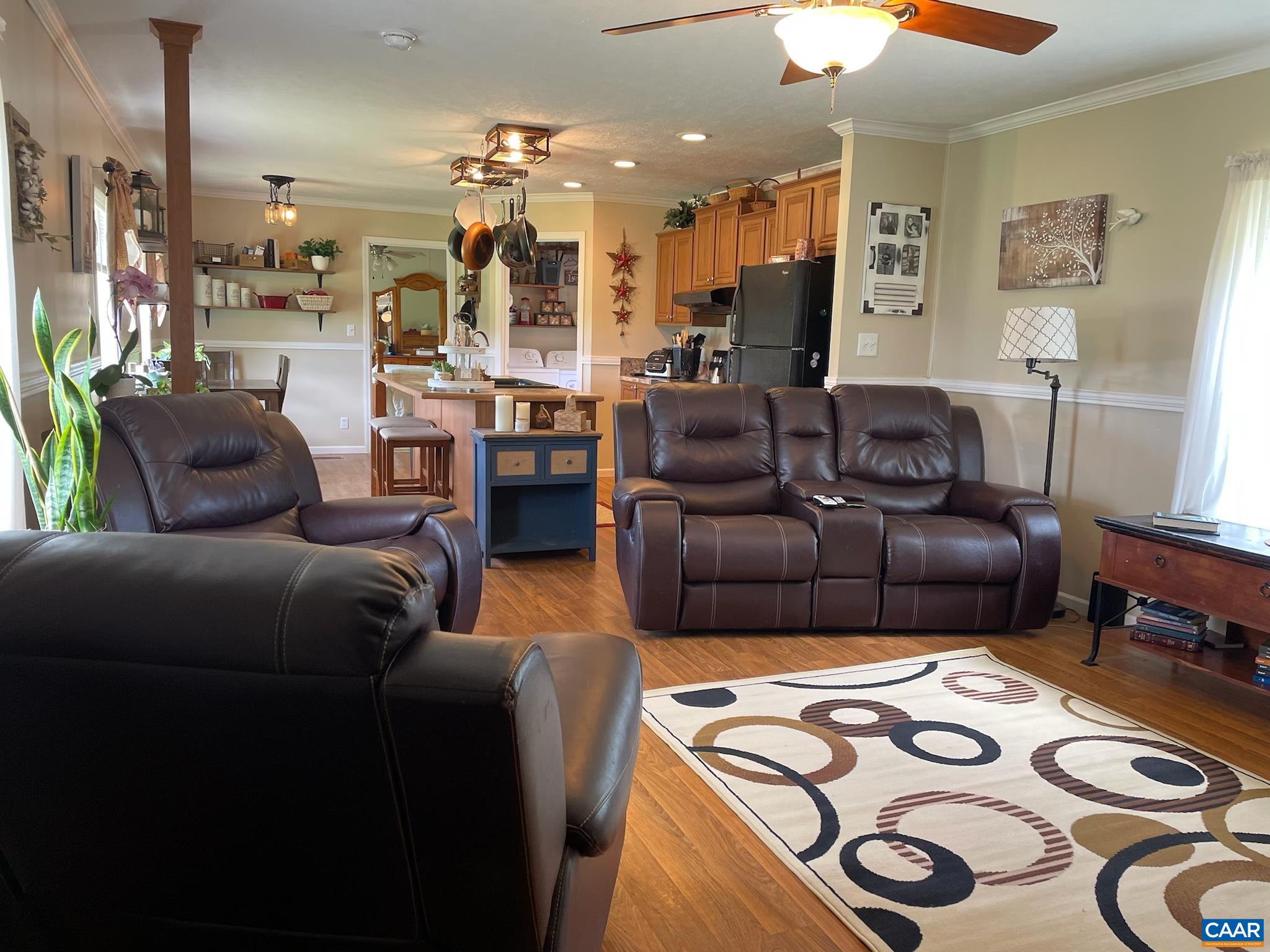 1619 South Constitution Route Dillwyn, VA 23936 - Photo 21 of 36 a living room with furniture and a wooden floor