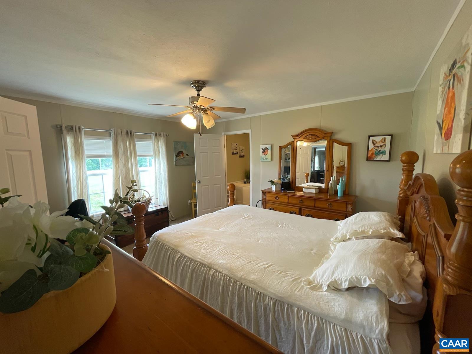 1619 South Constitution Route Dillwyn, VA 23936 - Photo 22 of 36 a bed room with two bed and a large mirror