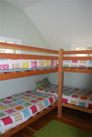 8 Warwick Road Gloucester, MA 01930 - Photo 5 of 11 a bedroom with a bed and window