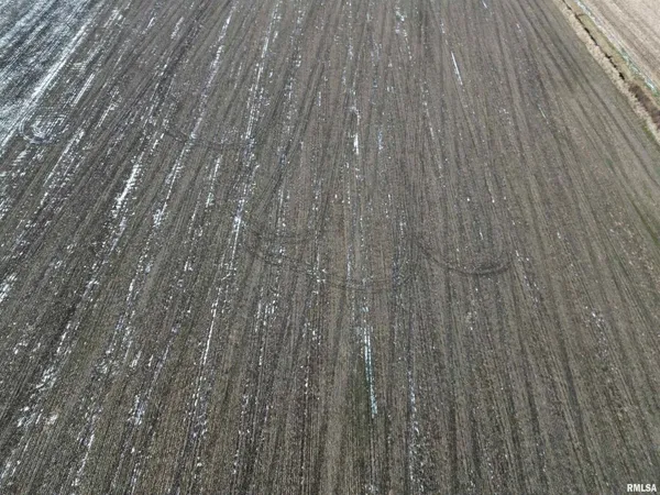 an empty room with wooden floor