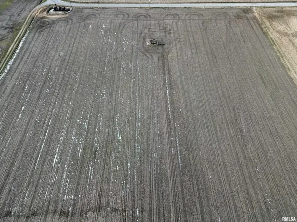 an empty room with wooden floor