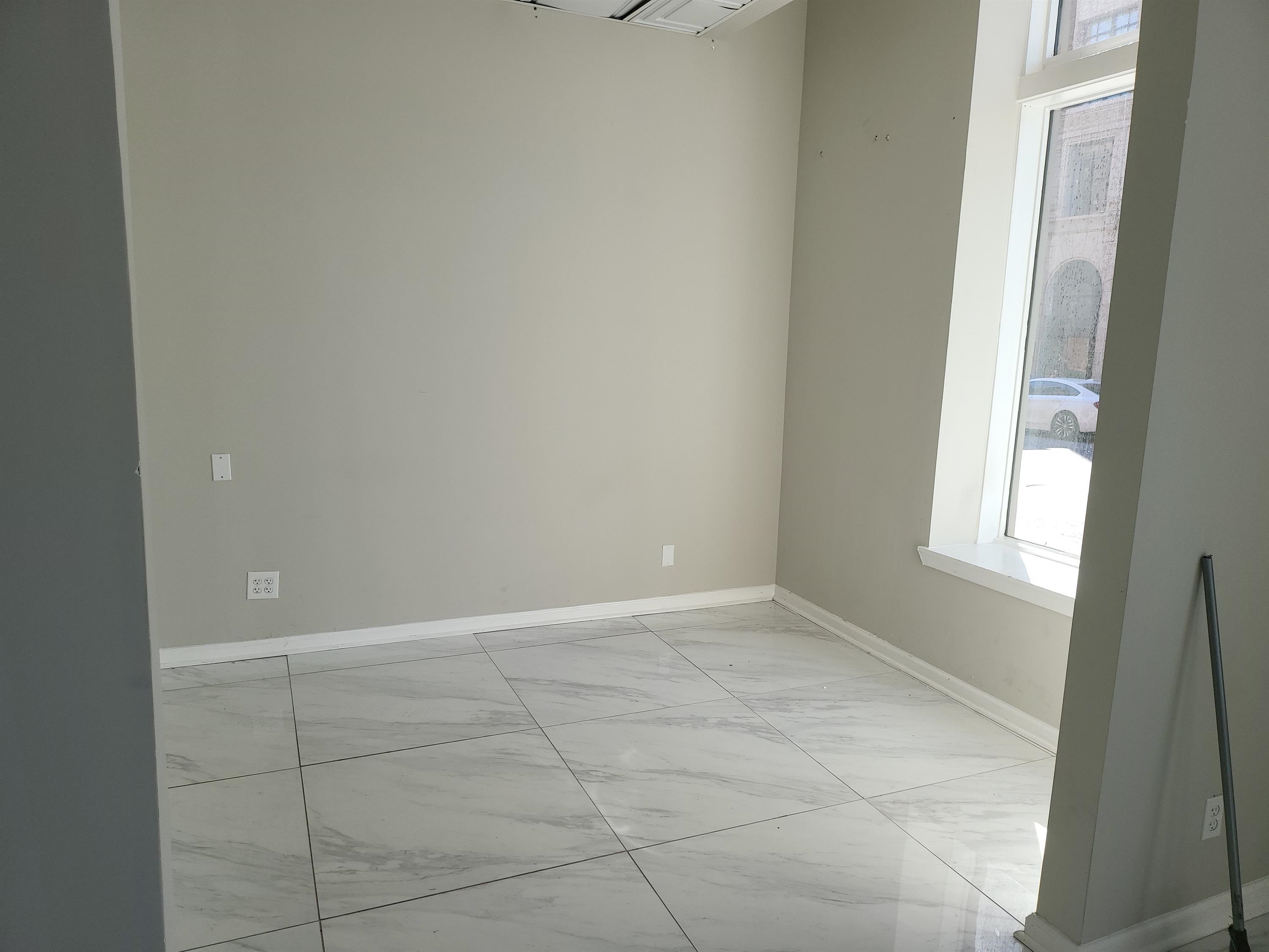 70 South Front Street Memphis, TN 38103 - Photo 12 of 12 a view of an empty room and window