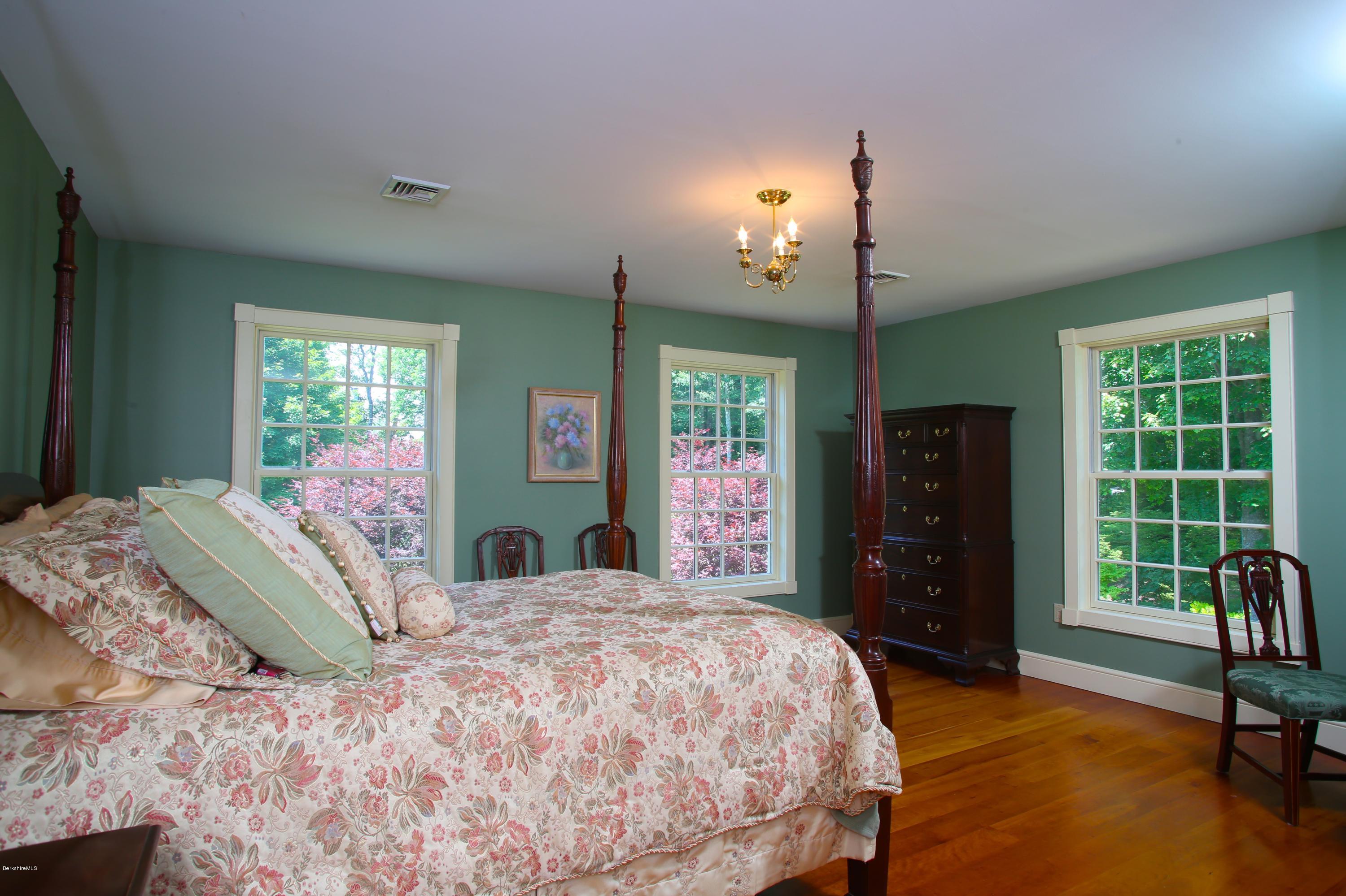 46 Stage Road Chesterfield, MA 01096 - Photo 20 of 34 a bedroom with a bed and a chair in it