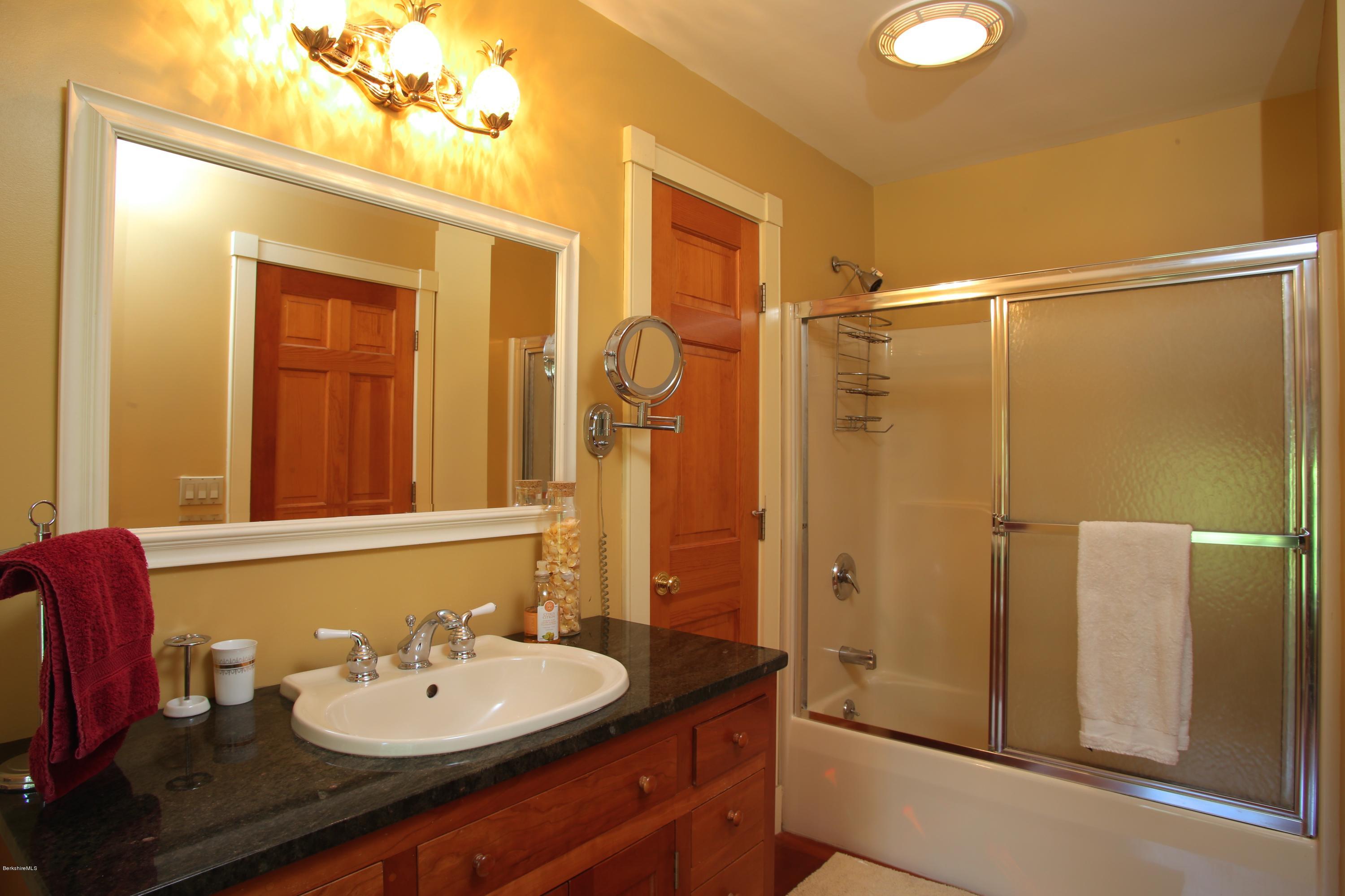46 Stage Road Chesterfield, MA 01096 - Photo 23 of 34 a bathroom with a sink and a mirror
