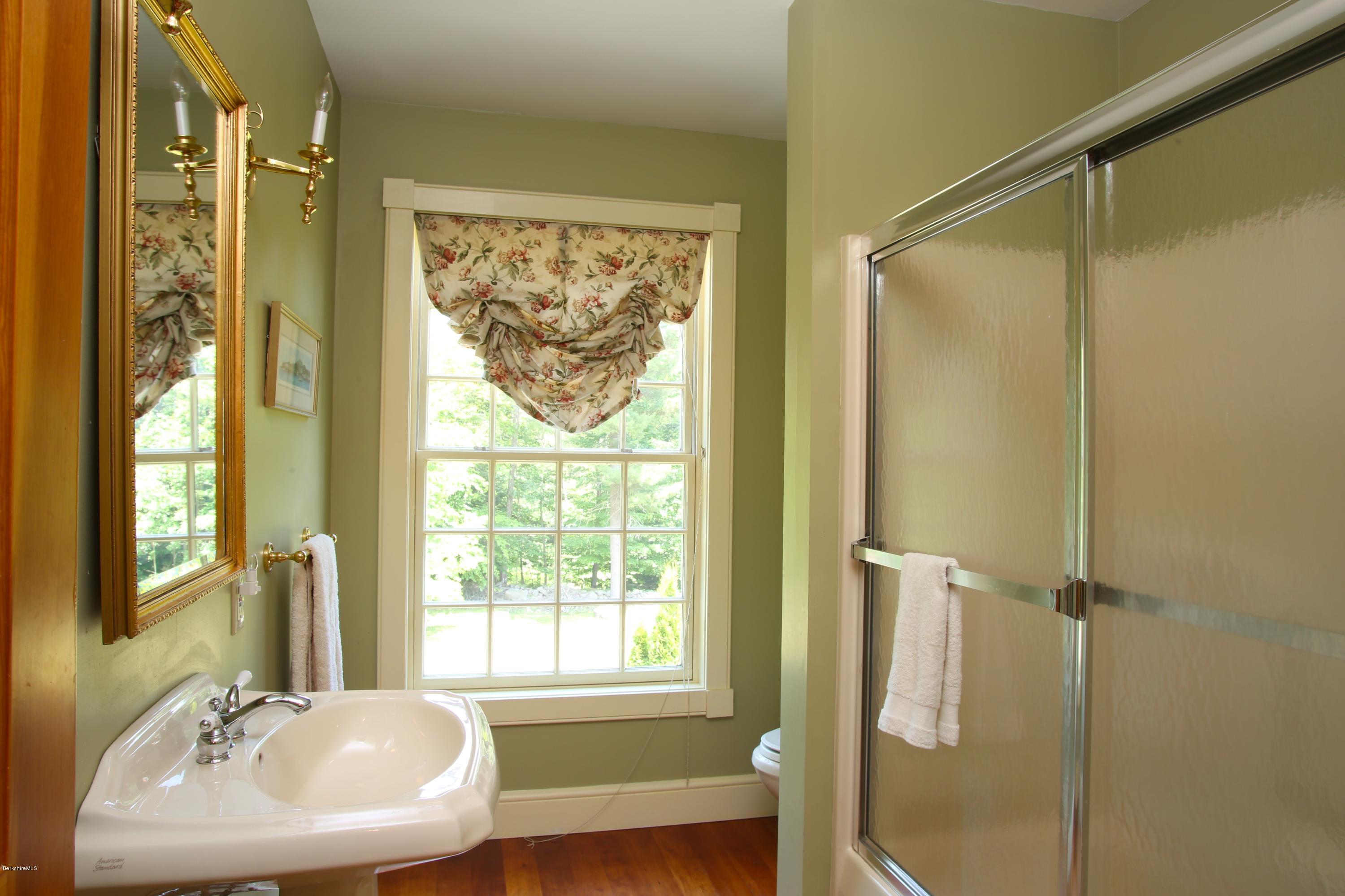 46 Stage Road Chesterfield, MA 01096 - Photo 26 of 34 a bathroom with a sink and a mirror