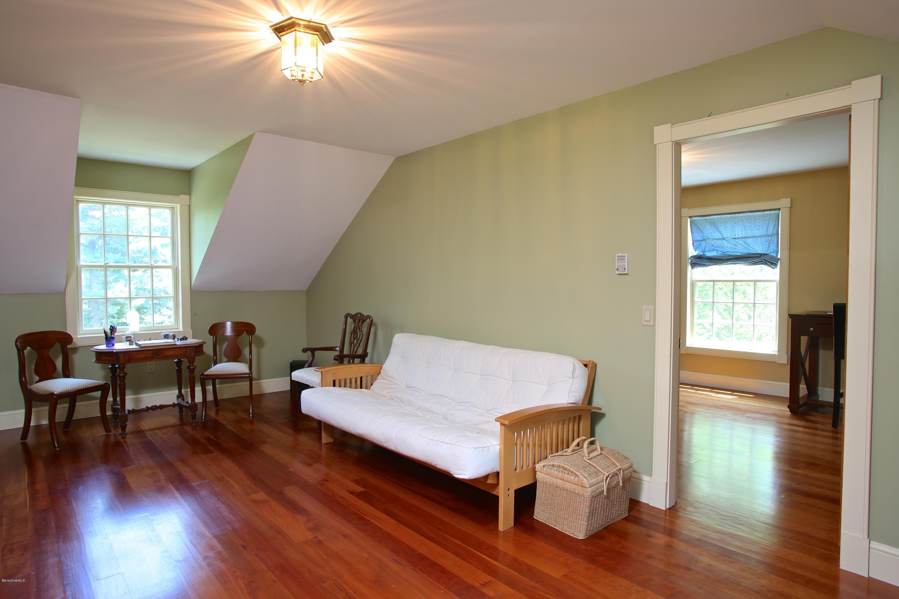 46 Stage Road Chesterfield, MA 01096 - Photo 27 of 34 a living room with furniture and a wooden floor