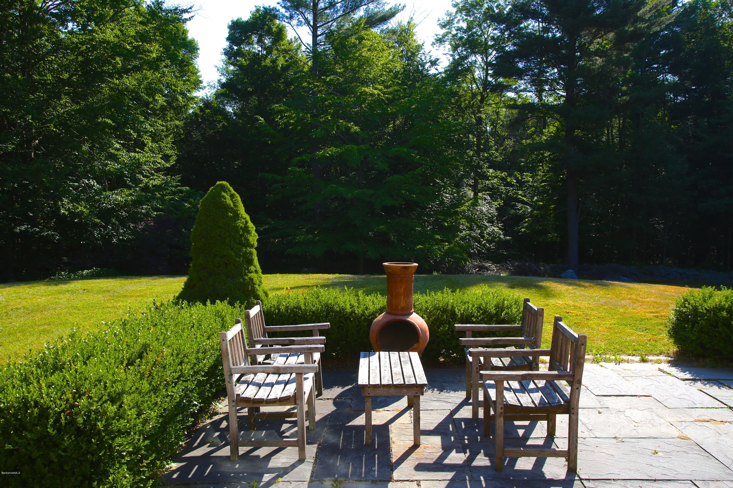 46 Stage Road Chesterfield, MA 01096 - Photo 8 of 34 a view of a swimming pool with a table and chairs