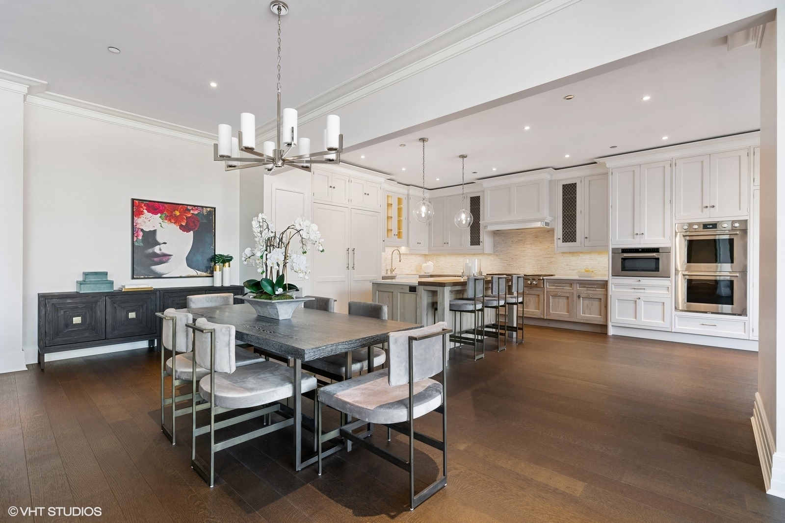9 West Walton Street, Unit 1402 Chicago, IL 60610 - Photo 11 of 31 a view of a dining room with furniture and wooden floor