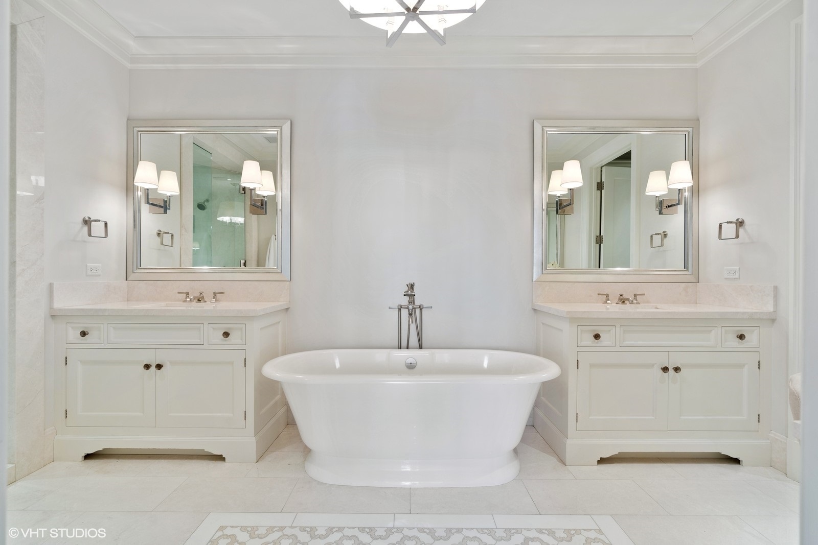 9 West Walton Street, Unit 1402 Chicago, IL 60610 - Photo 16 of 31 a bathroom with a sink and a mirror