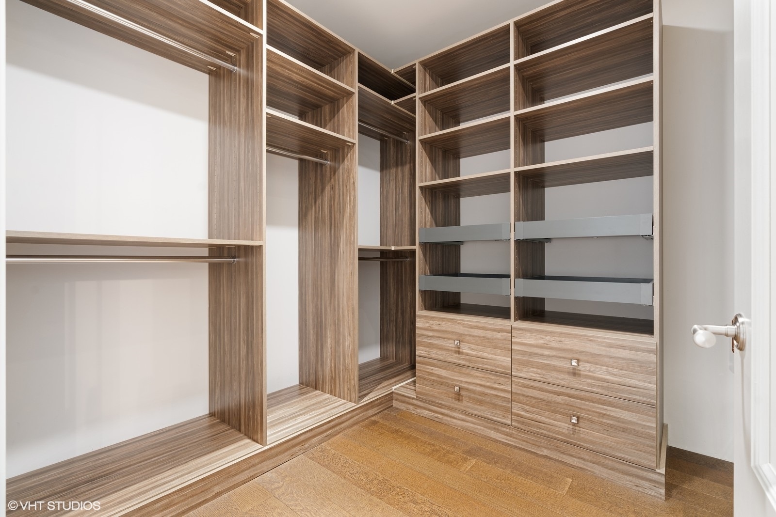 9 West Walton Street, Unit 1402 Chicago, IL 60610 - Photo 18 of 31 a view of walk in closet with empty racks