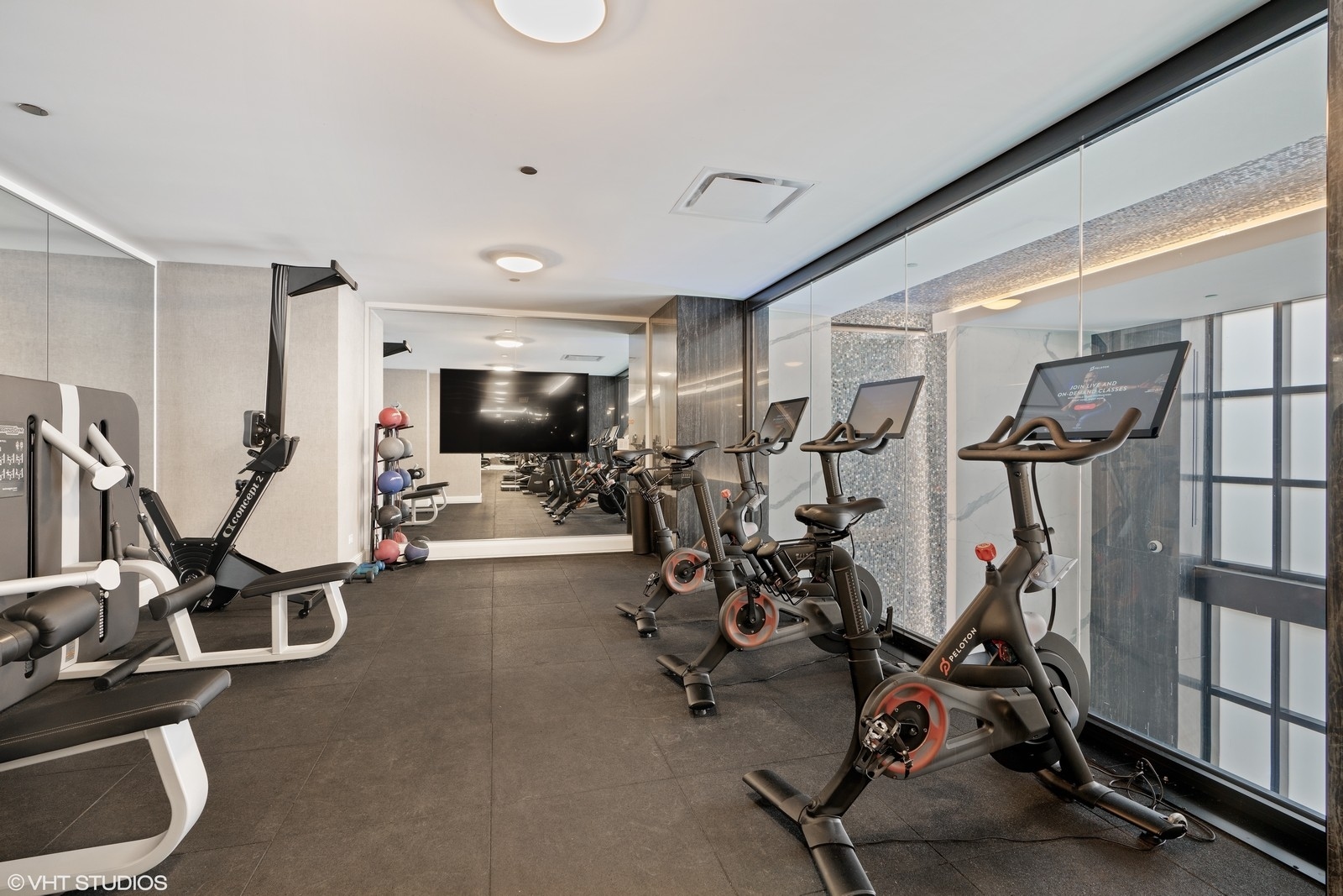 9 West Walton Street, Unit 1402 Chicago, IL 60610 - Photo 27 of 31 a view of a room with gym equipment