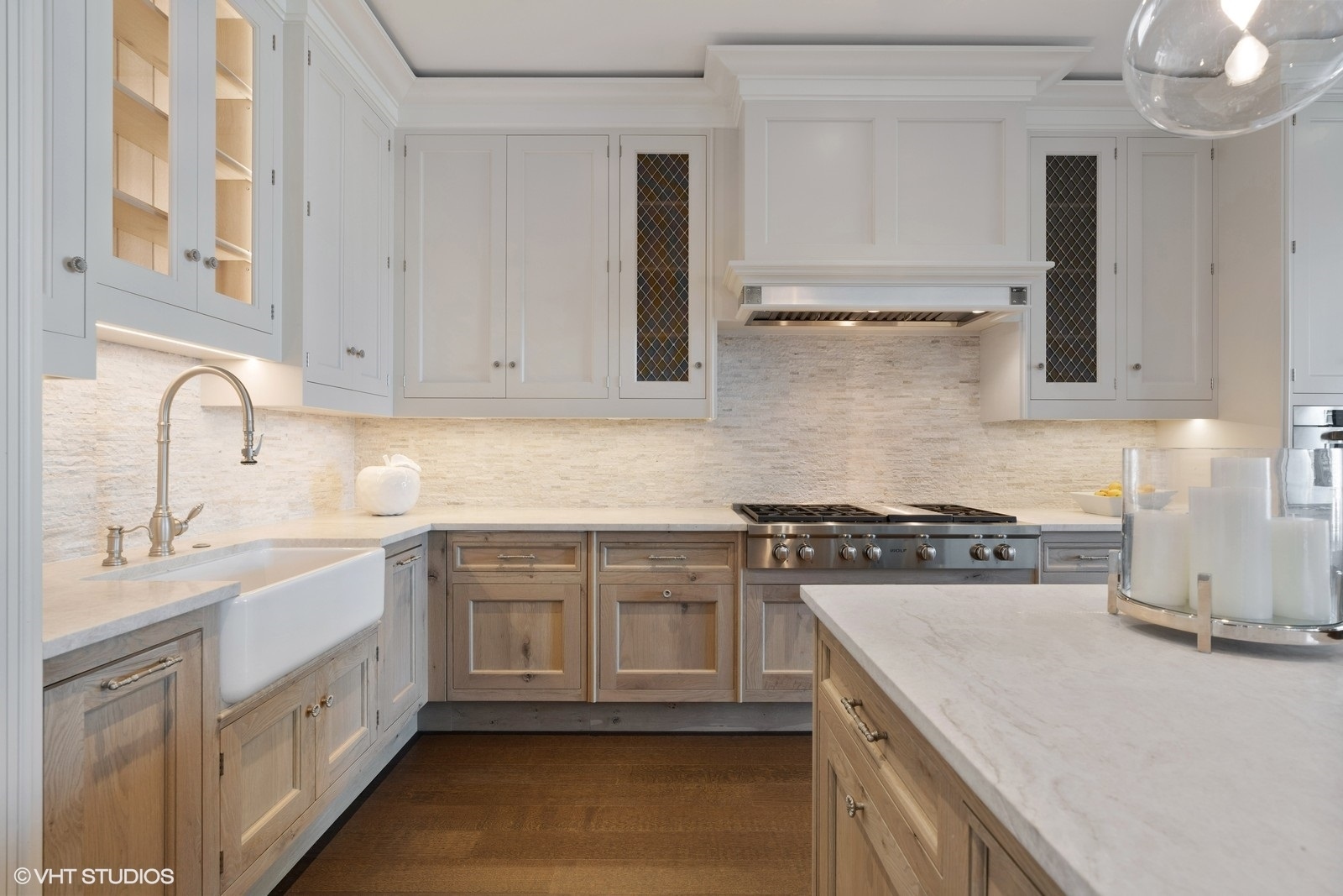 9 West Walton Street, Unit 1402 Chicago, IL 60610 - Photo 9 of 31 a kitchen with a stove sink and cabinets