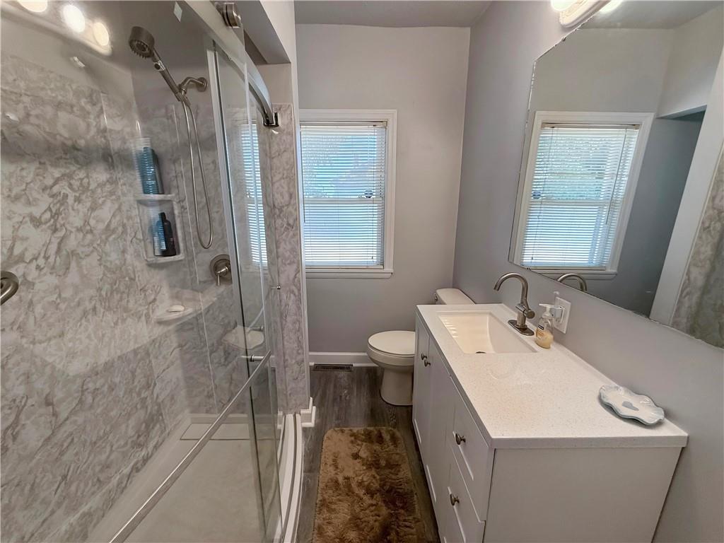 450 Clay Street Rochester, PA 15074 - Photo 12 of 34 a bathroom with a sink a toilet and shower