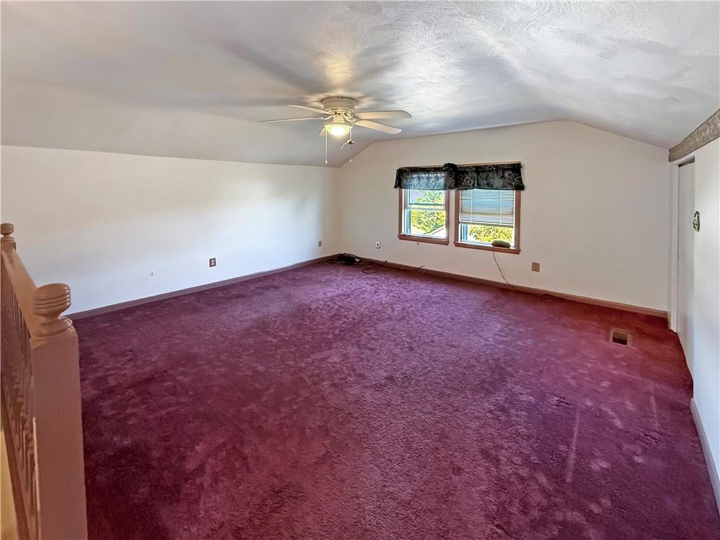 450 Clay Street Rochester, PA 15074 - Photo 19 of 34 en empty room with windows and ceiling fan