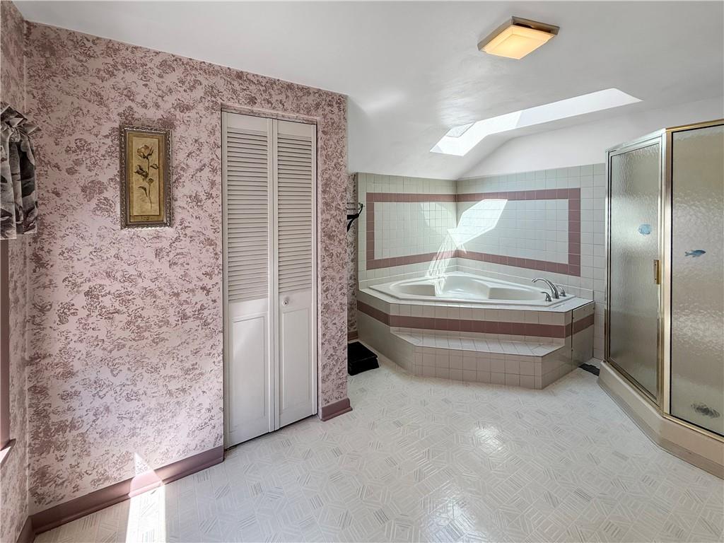 450 Clay Street Rochester, PA 15074 - Photo 22 of 34 a bathroom with a bathtub and shower