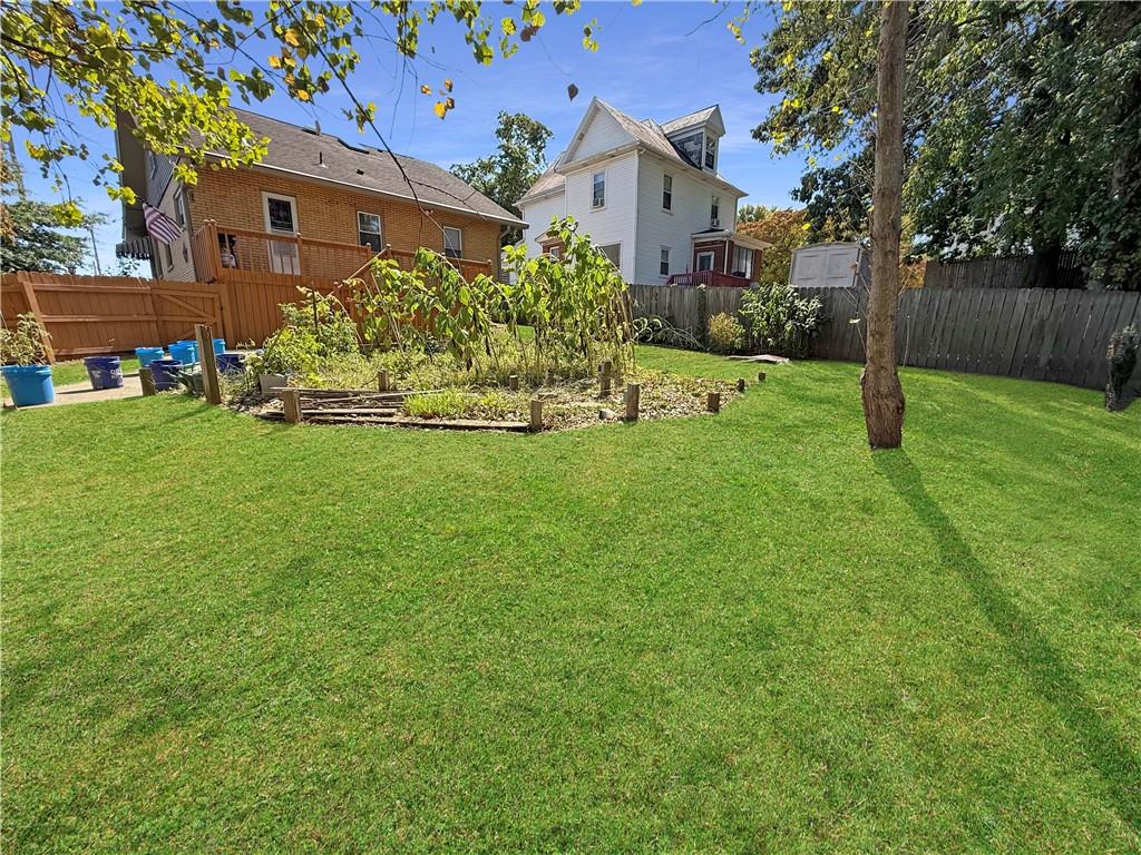 450 Clay Street Rochester, PA 15074 - Photo 29 of 34 a front view of a house with garden