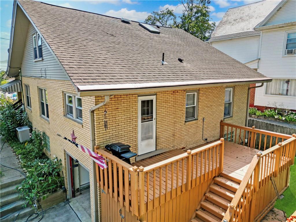 450 Clay Street Rochester, PA 15074 - Photo 3 of 34 a view of wooden house with a fence
