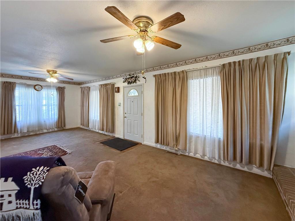 450 Clay Street Rochester, PA 15074 - Photo 6 of 34 a living room with furniture and a ceiling fan