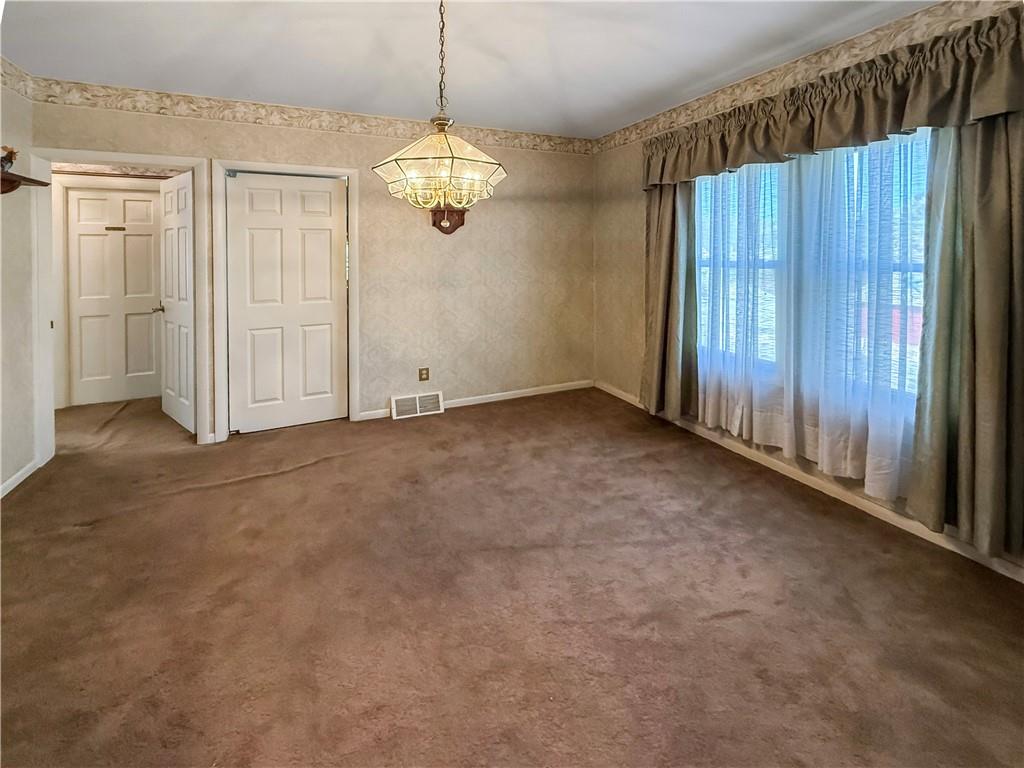 450 Clay Street Rochester, PA 15074 - Photo 7 of 34 a view of an empty room with a window