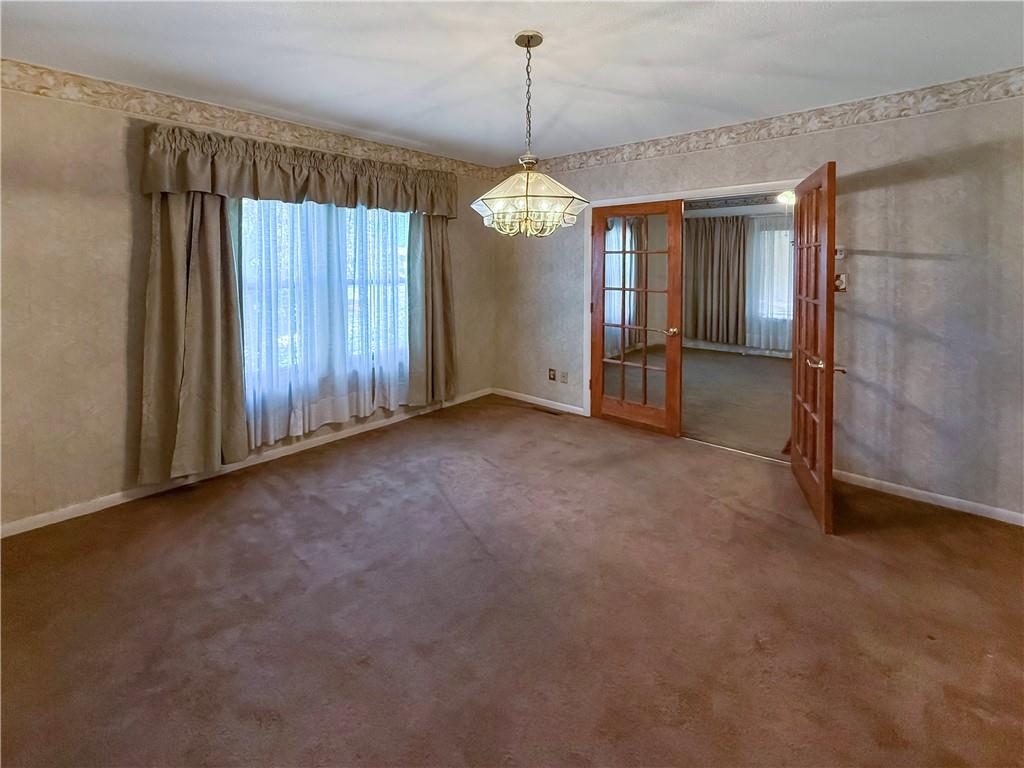 450 Clay Street Rochester, PA 15074 - Photo 8 of 34 an empty room with windows and entrance