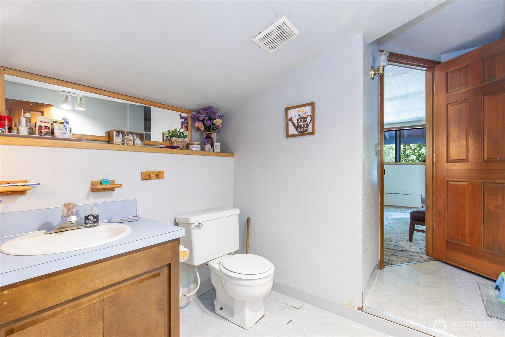 1497 Old Military Road Southeast Tenino, WA 98589 - Photo 19 of 34 a bathroom with a sink a toilet and shower