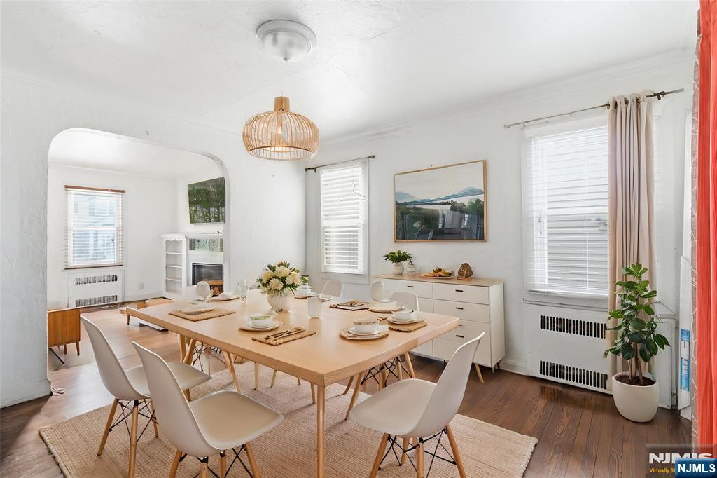 327 Field Place Hillside, NJ 07205 - Photo 4 of 18 a view of a dining room with furniture and wooden floor