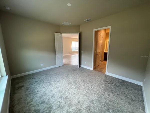 an empty room with a natural light
