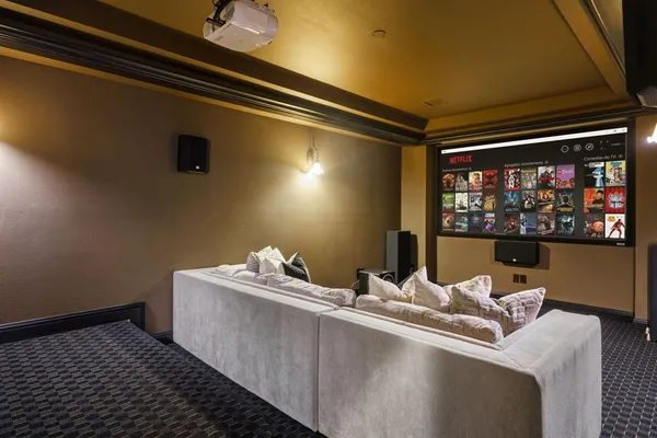 a room with furniture and a flat screen tv