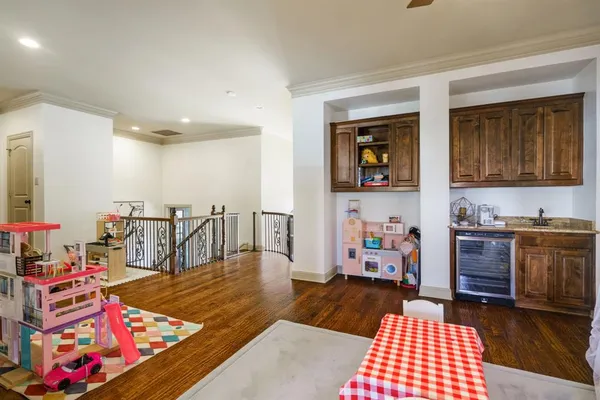 a living room with furniture and a rug