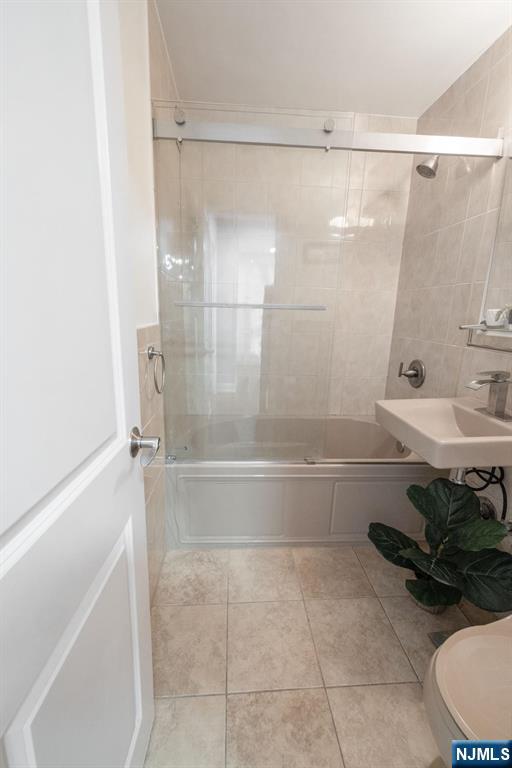 6600 JFK Boulevard East, Unit 23J West New York, NJ 07093 - Photo 18 of 26 a bathroom with a sink and a shower