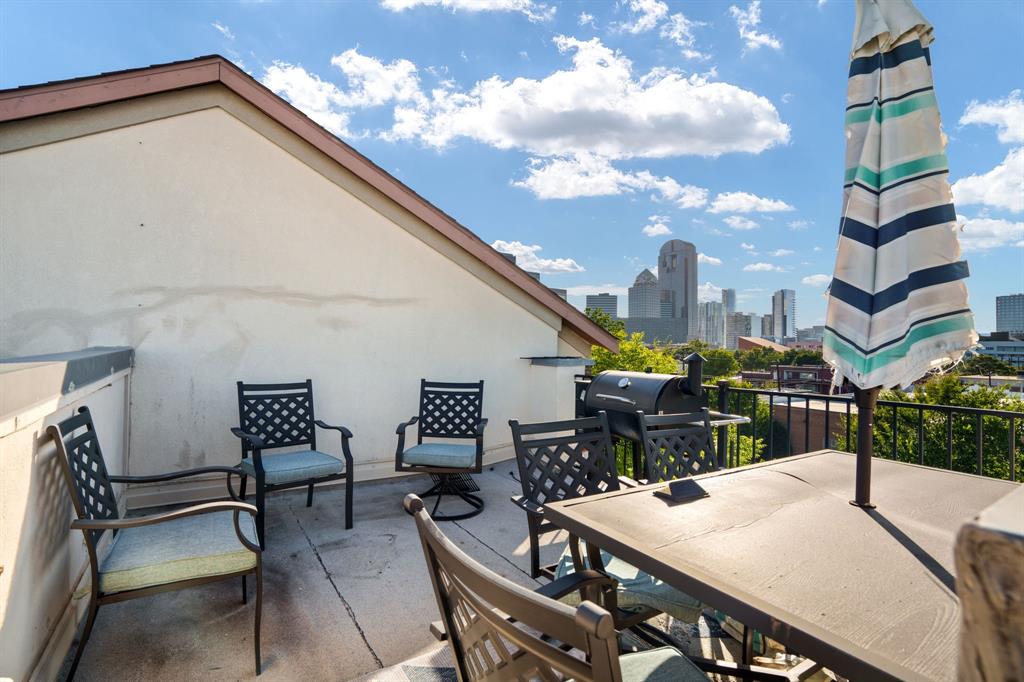 2706 Floyd Street Dallas, TX 75204 - Photo 21 of 22 a view of a patio with table and chairs and potted plants