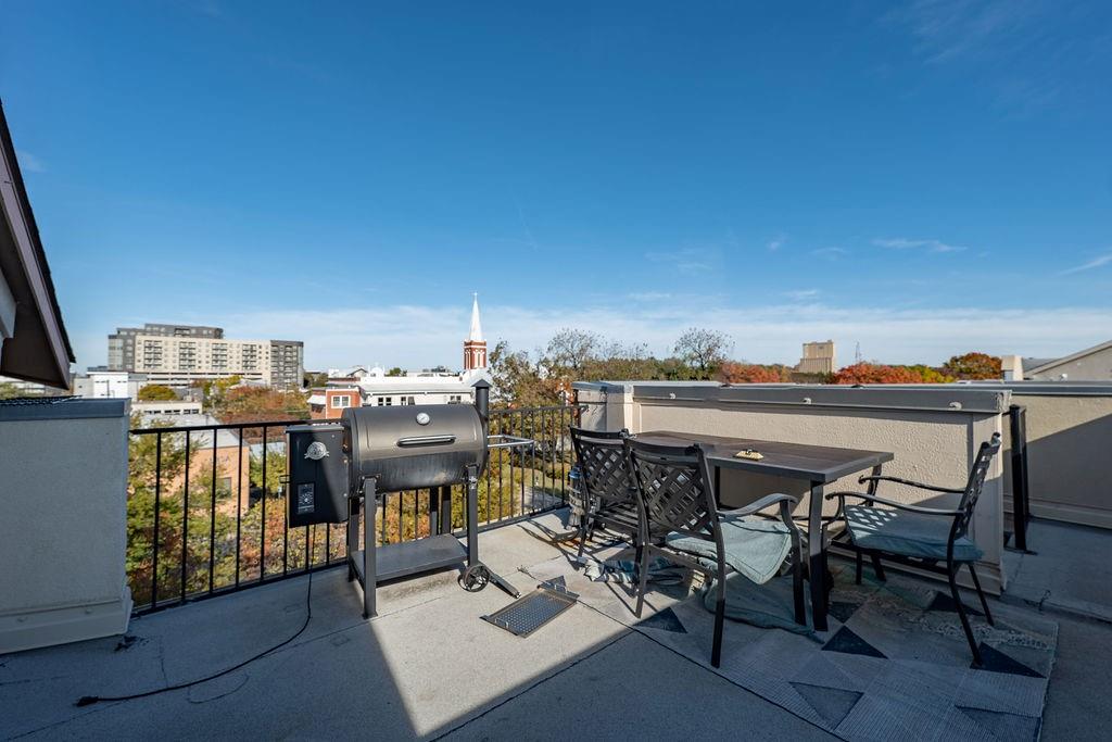2706 Floyd Street Dallas, TX 75204 - Photo 22 of 22 a view of a chairs and table on the terrace