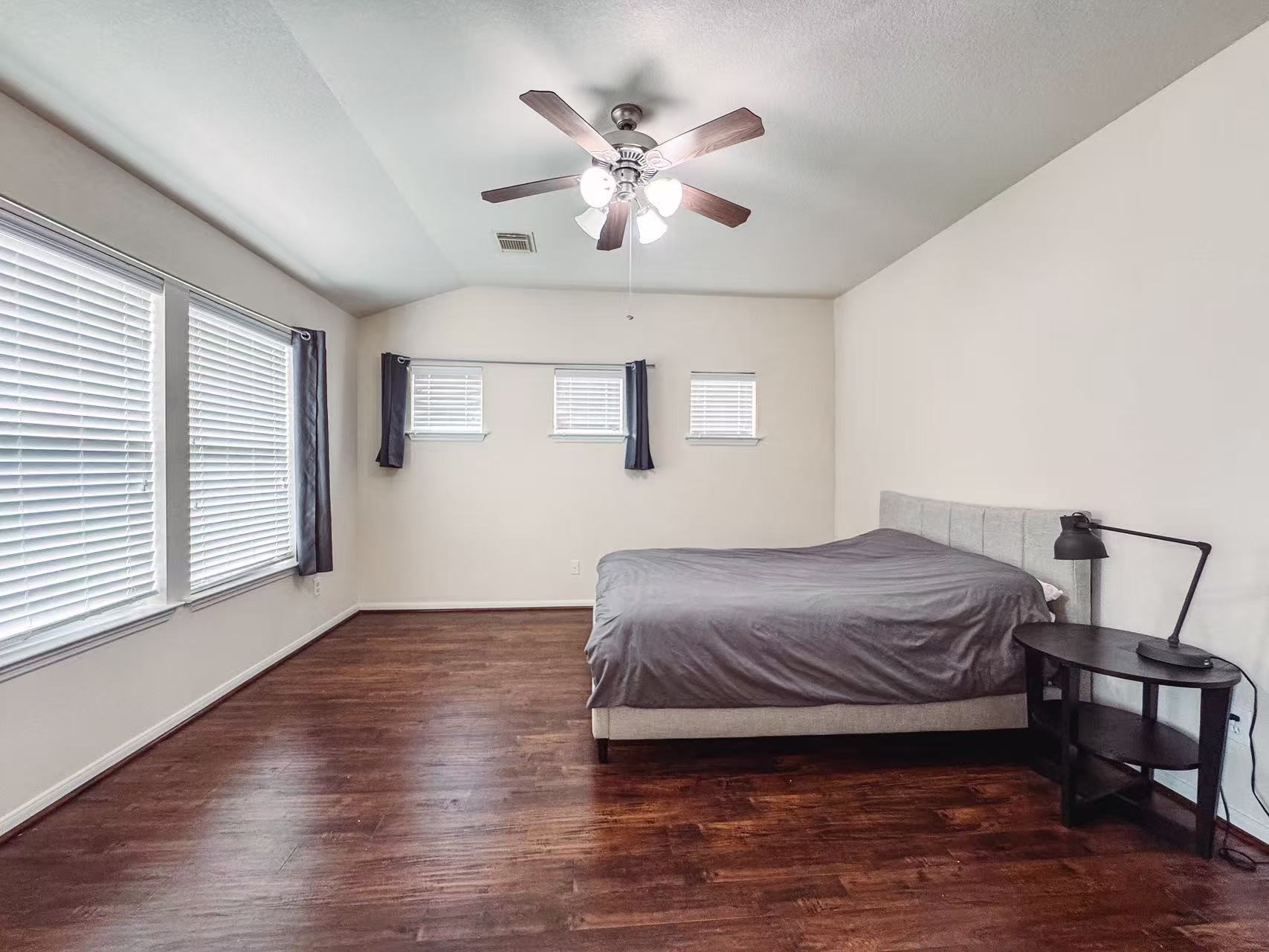 3923 Calgary Circle Missouri City, TX 77459 - Photo 13 of 25 a bedroom with a bed and window