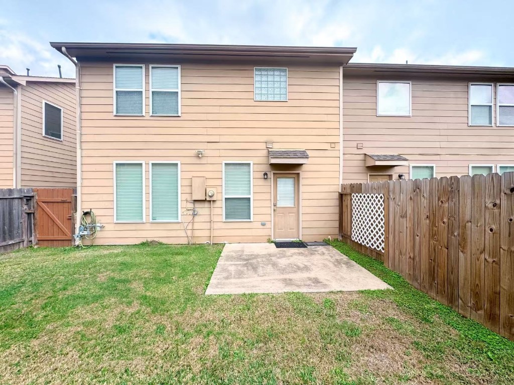 3923 Calgary Circle Missouri City, TX 77459 - Photo 24 of 25 a front view of a house with a yard and garage
