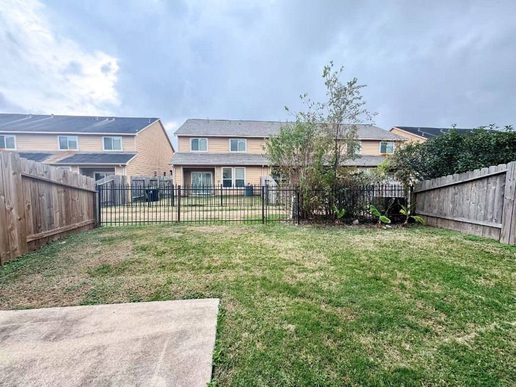 3923 Calgary Circle Missouri City, TX 77459 - Photo 25 of 25 a front view of a house with garden