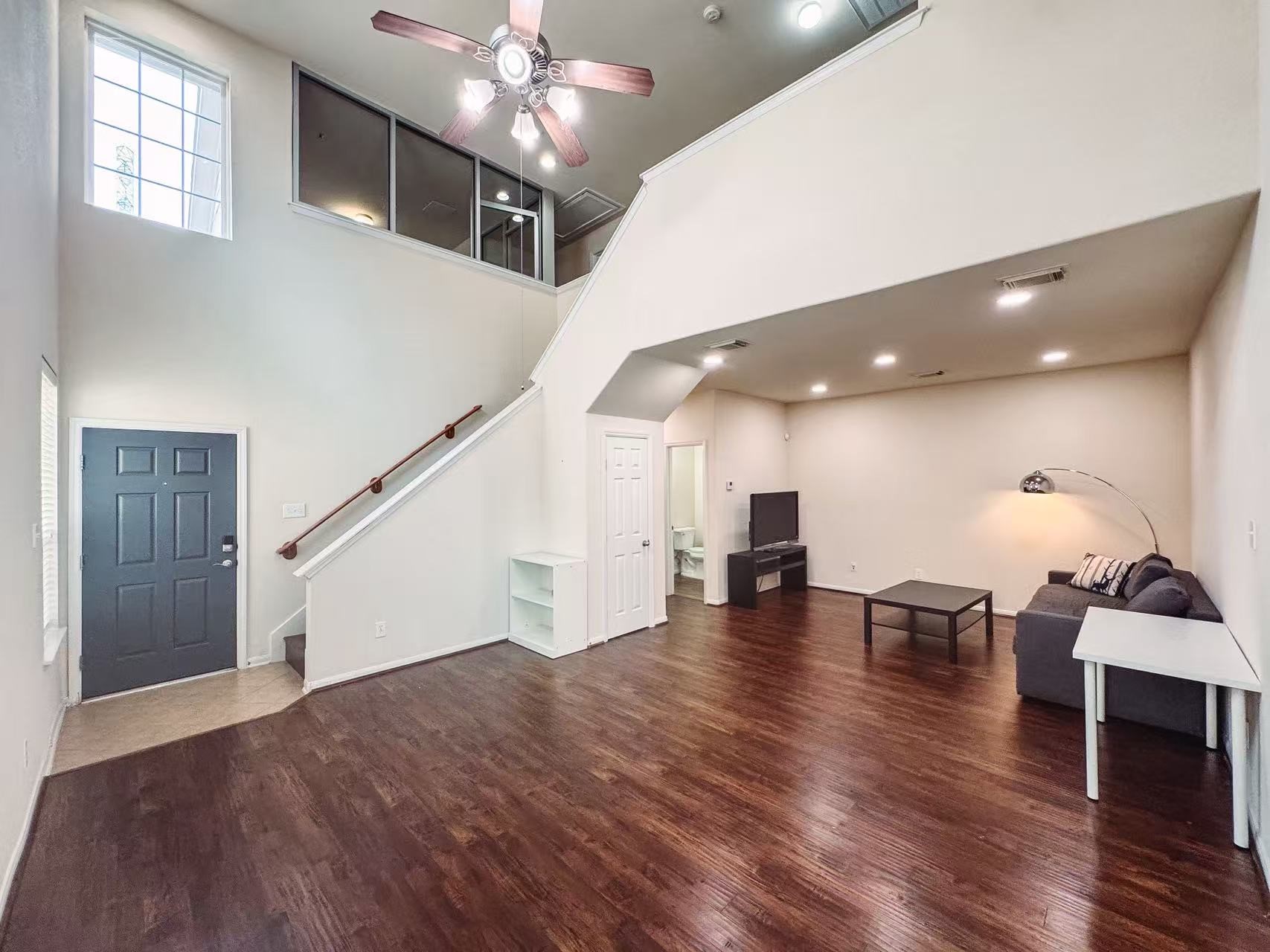 3923 Calgary Circle Missouri City, TX 77459 - Photo 3 of 25 a view of livingroom and dining room with wooden floor