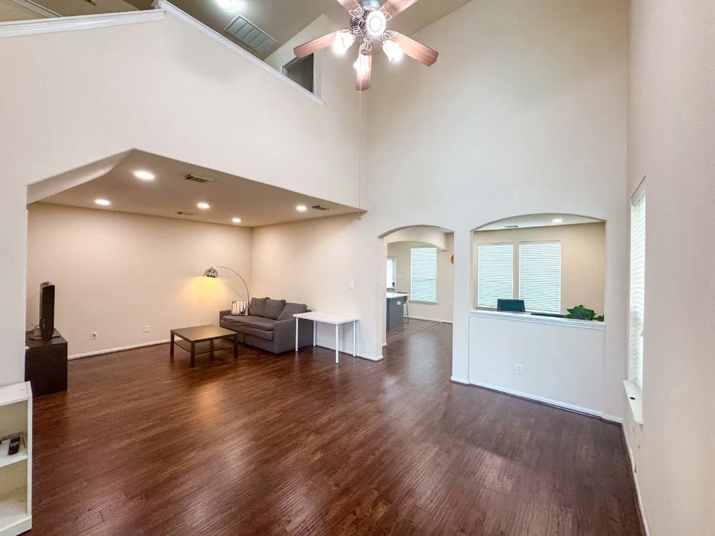 3923 Calgary Circle Missouri City, TX 77459 - Photo 4 of 25 a view of a livingroom with furniture and wooden floor