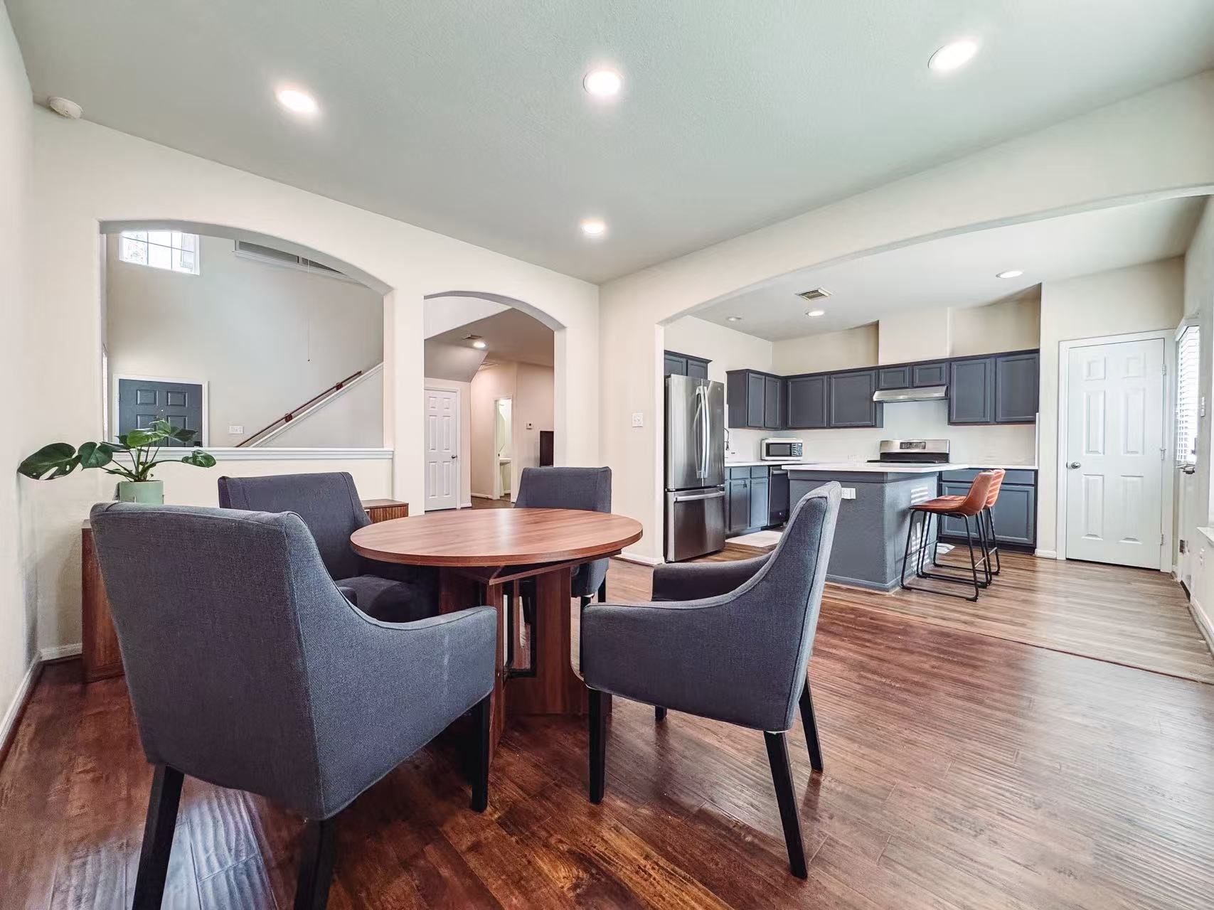 3923 Calgary Circle Missouri City, TX 77459 - Photo 6 of 25 a dining room with furniture and wooden floor