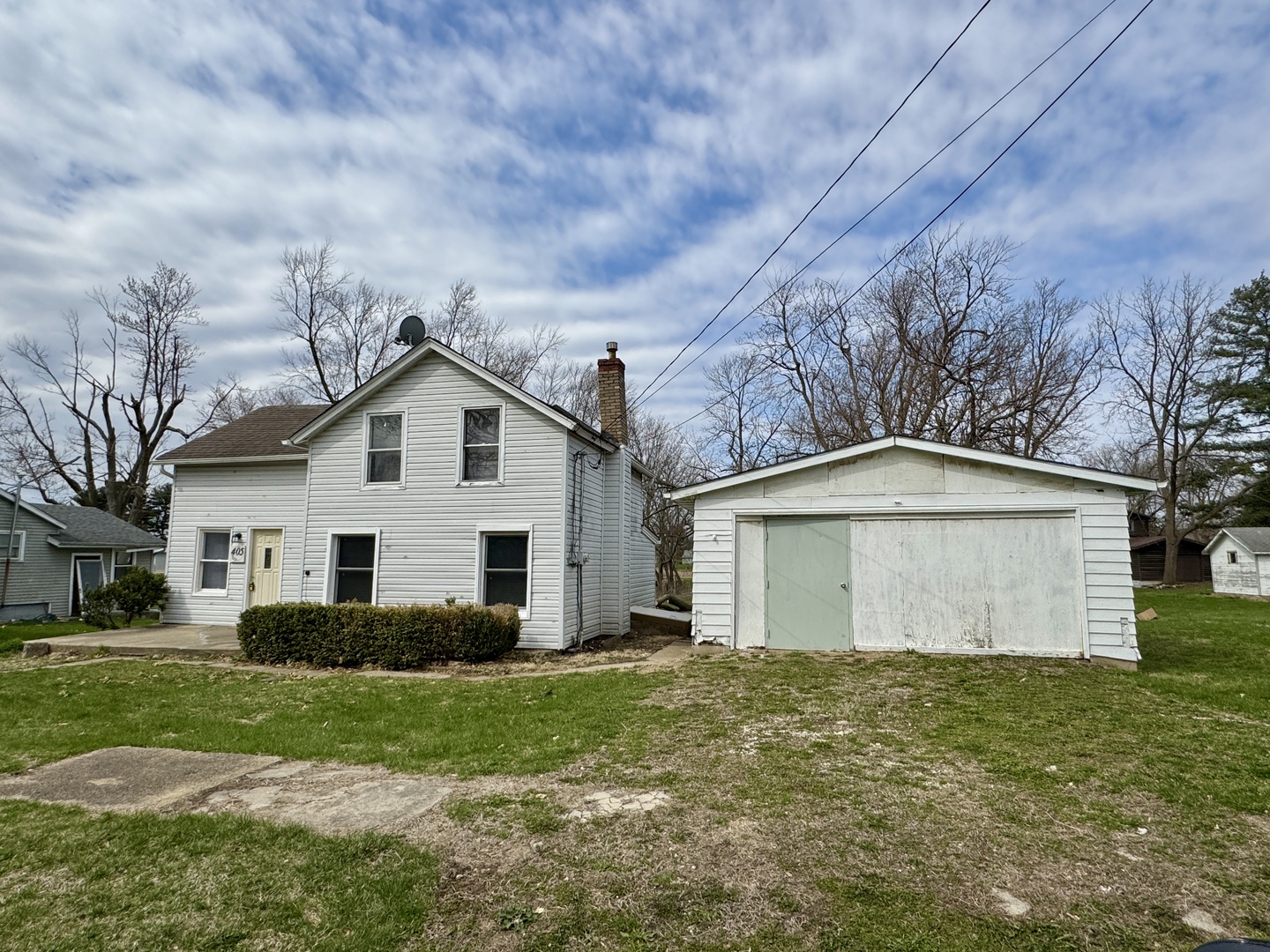 405 North 4th Street Neponset, IL 61345 - Photo 1 of 20 a view of a house with a yard