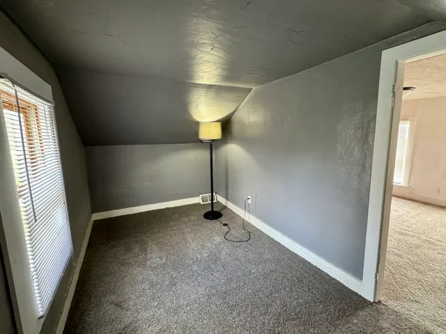 a view of a livingroom with a staircase