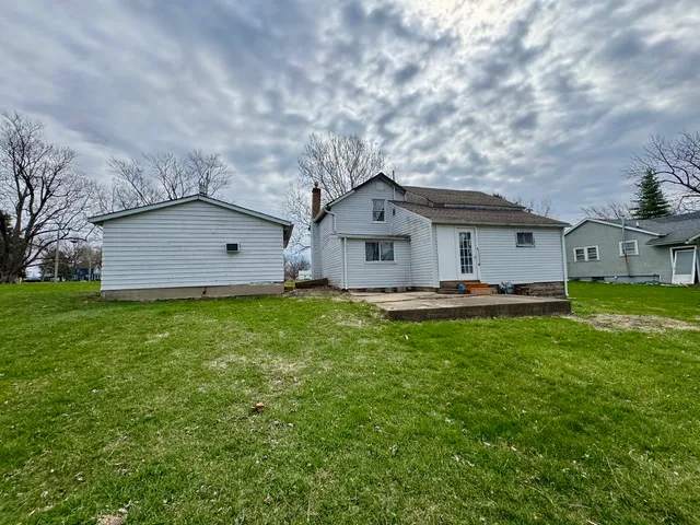 a house view with a garden space
