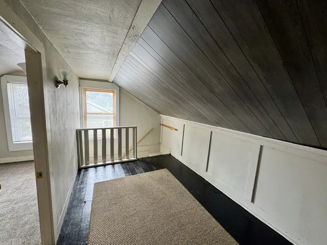 a view of an entryway with a window